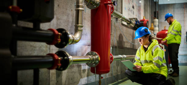 istock female engineer in turbine room 1188291379