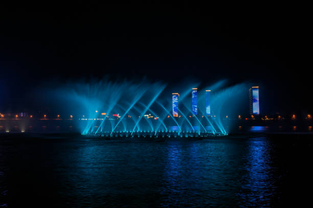 istock Music fountain on the water at night 1188293231