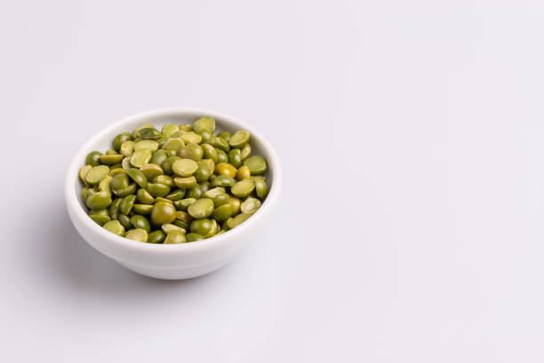 istock Split dried uncooked peas isolated on white background, close-up, studio shot, soft light, copy space. Christmas dish 1188294017