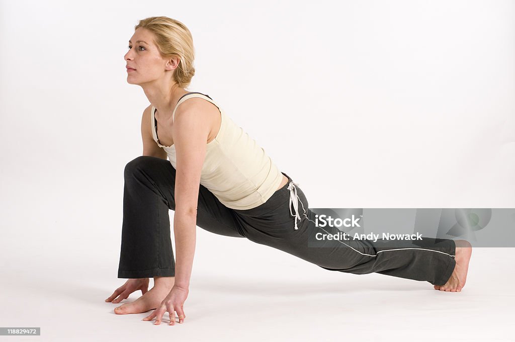 Sonnengruss_3 and 8 woman in Yoga position on the white background Adult Stock Photo