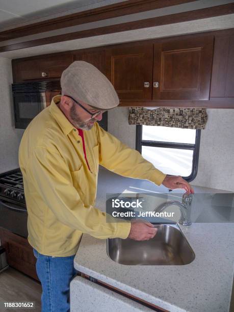 Man Washing Hands In Rv Sink Stock Photo - Download Image Now - Motor Home, Sink, Adult