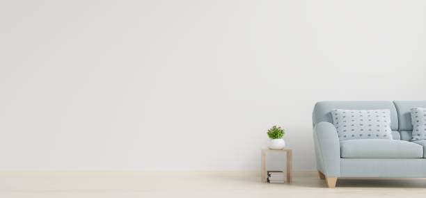 istock Modern living room interior with sofa and green plants,table on white wall background. 1188303390