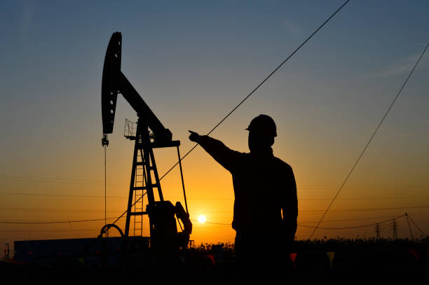 istock The oil workers in the job 1188306031