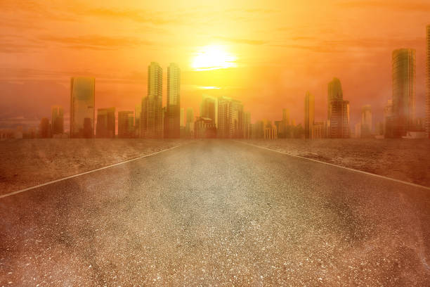 istock Heatwave on the city with the glowing sun background 1188307872