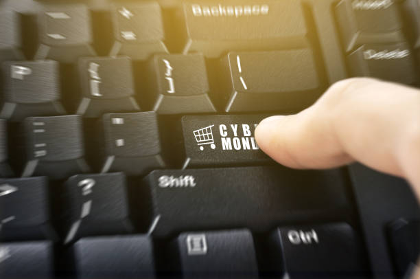 istock Finger push the button with Cyber Monday text on the keyboard 1188308701