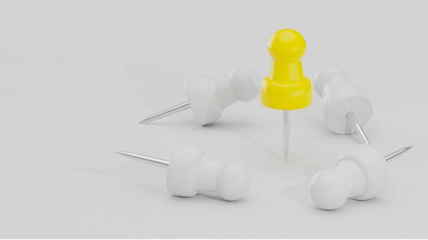 istock Push pins yellow color 1188311158