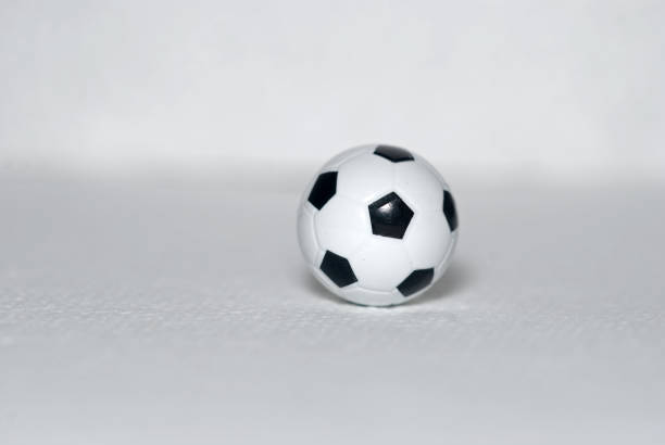 istock Small toy, plastic soccer ball on a white background 1188312622