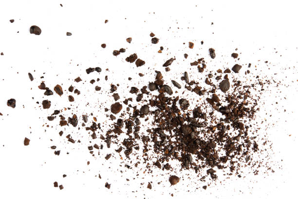 istock Dark ground coffee bean crushed craked broken isolated on white background top view photo object design 1188320235