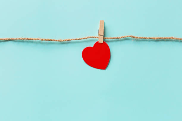 istock Valentine's day background with hearth on blue. Flat lay, top view, mockup, template, copy space. Minimal abstract composition for 14 February celebration 1188326801