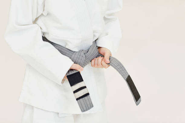 istock Young judoist getting a belt 1188330760