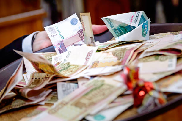 istock Russian money of various denominations lie on the table mixed. 1188330950