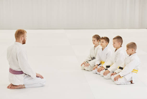 istock Coach with his group in gym 1188330961