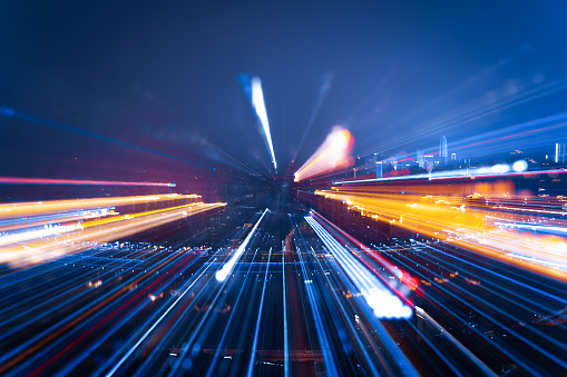 Nightly skyline with bright lights, zoomed