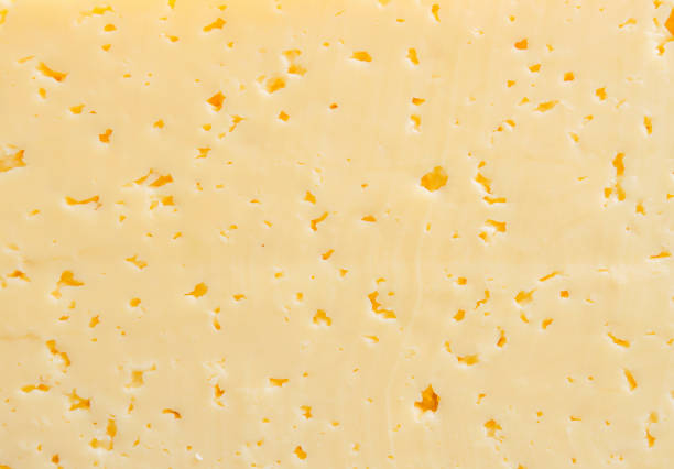 Yellow cheese texture for food background. stock photo