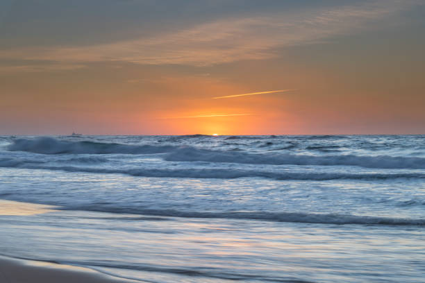 istock Clear Skies Beach Sunrise Seascape 1188341445