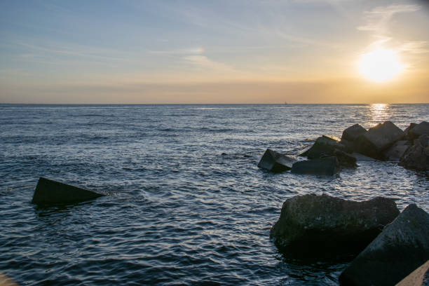 istock Beautiful colorful dramatic sunset on the sea. dramatic sky with clouds 1188342611