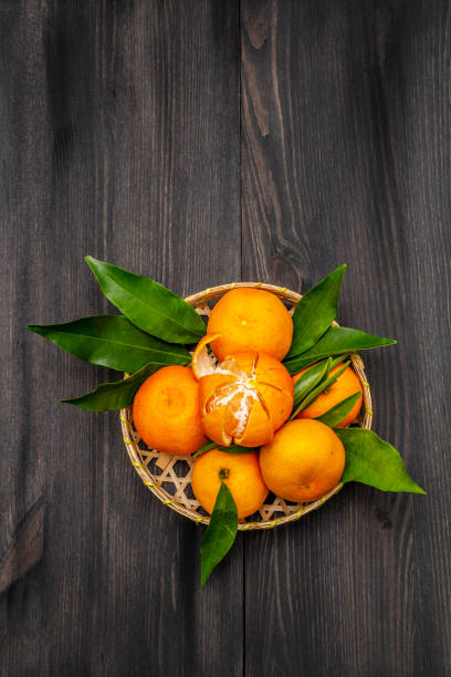 istock Fresh ripe tangerines with leaves 1188343034