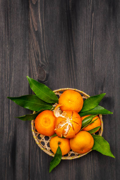 istock Fresh ripe tangerines with leaves 1188343569
