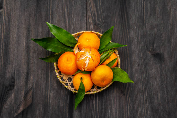 istock Fresh ripe tangerines with leaves 1188343759