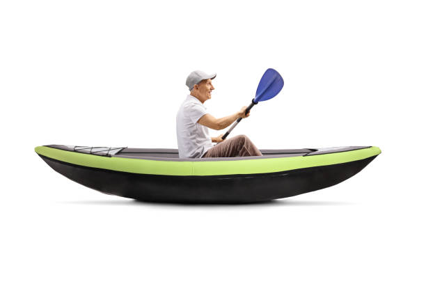 istock Senior man in a kayak paddling 1188343769