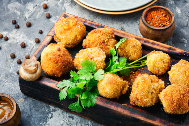 istock Mushrooms in breadcrumbs. 1188348915