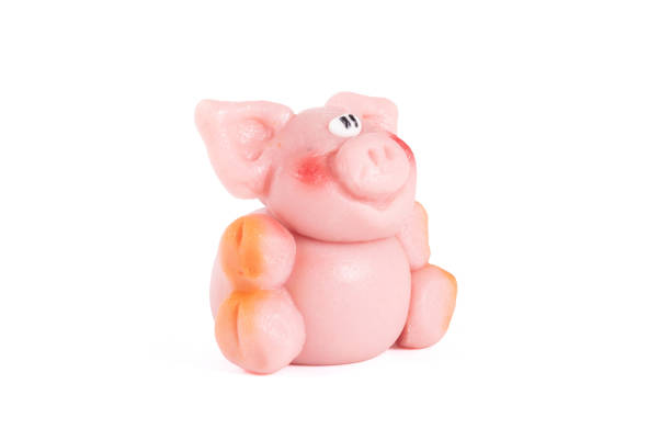 Marzipan pig, ready to be eaten, isolated on white