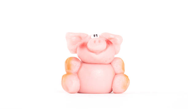 istock Marzipan pig, ready to be eaten, isolated on white 1188349023