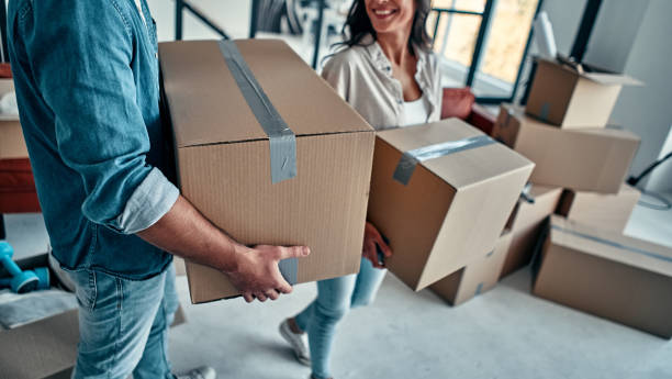 istock Couple moving in new home. 1188349380