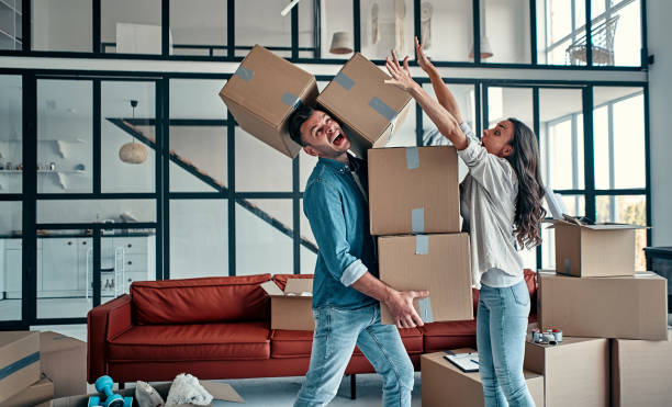 istock Couple moving in new home. 1188349388