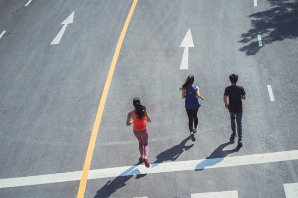 istock Asian friends group running in the morning. Top View. 1188356589