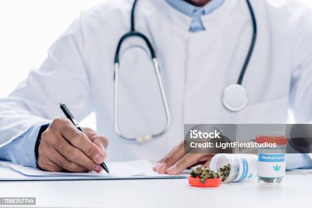 Cropped View Of Doctor In White Coat Writing Isolated On White Stock Photo - Download Image Now