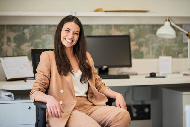 istock Confident businesswoman sitting down portrait. 1188357839