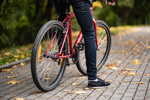 istock Young man biking in city 1188364441