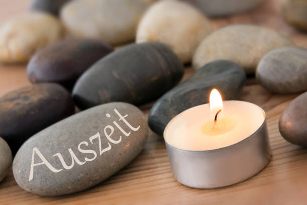 istock German time-out candle with stones as background 1188368342