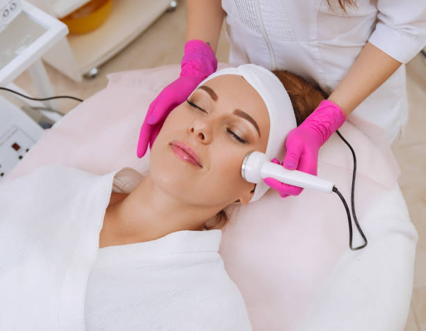 istock Ultrasound cavitation procedure. Anti-aging, lifting procedure. 1188370387