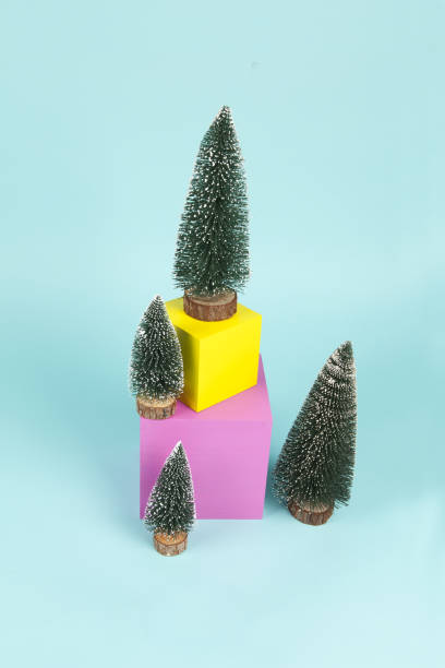 istock minimal christmas trees and cubes 1188370443