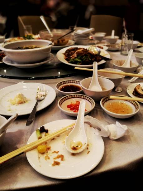istock leftover food on a table after a big party. 1188371290