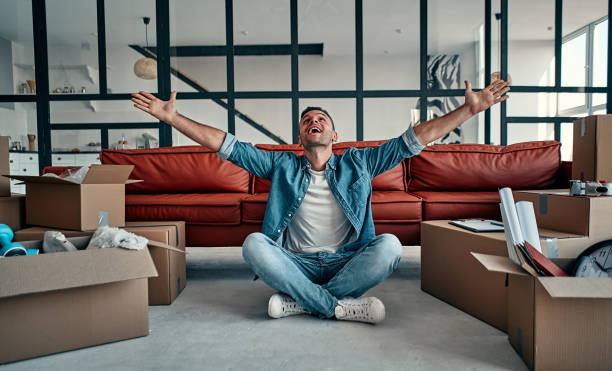 istock Couple moving in new home. 1188372472