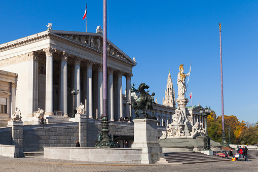 Vienna, Austria - November 2, 2015: Pallas Athene Fountain located in front of the Austrian Parliament Building. It was erected between 1893 and 1902 by Carl Kundmann, Josef Tautenhayn, Hugo Haerdtl