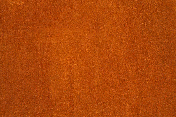 Rust and oxidized metal brown texture. Rusted orange grunge metal background stock photo