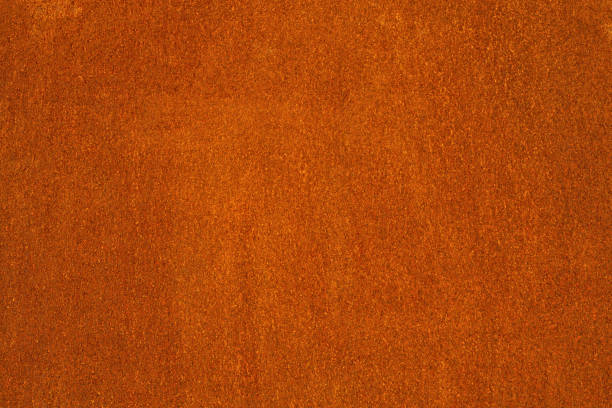 Rust and oxidized metal brown texture. Rusted orange grunge metal background Rust and oxidized metal brown texture. Rusted orange grunge metal background. Old and dirty iron building wall chemical symbol sn stock pictures, royalty-free photos & images