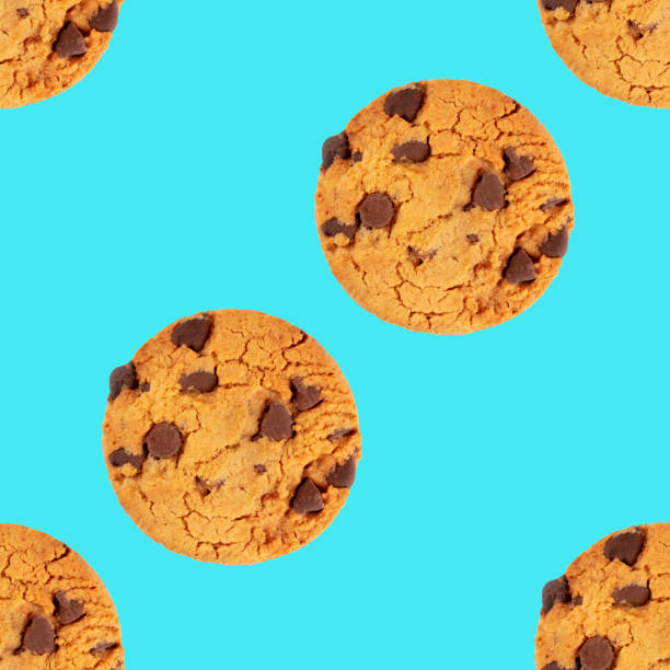 istock Chocolate chip cookies, gluten-free, a seamless repeat pattern on a blue background 1188377077