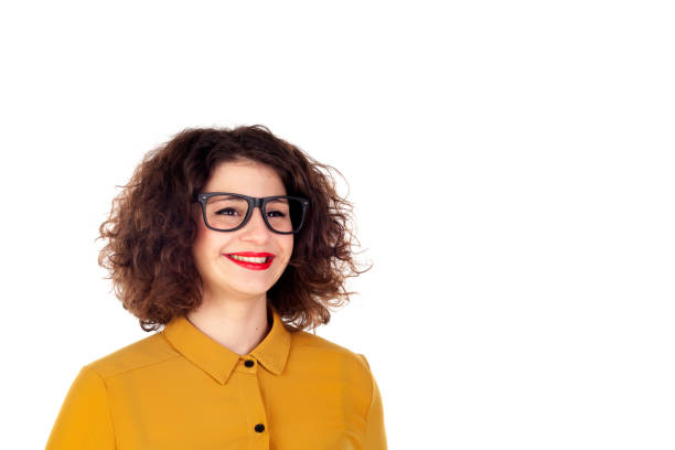 Smiling girl with yellow shirt and glasses Smiling girl with yellow shirt and glasses isolated on a white background big fat lips stock pictures, royalty-free photos & images