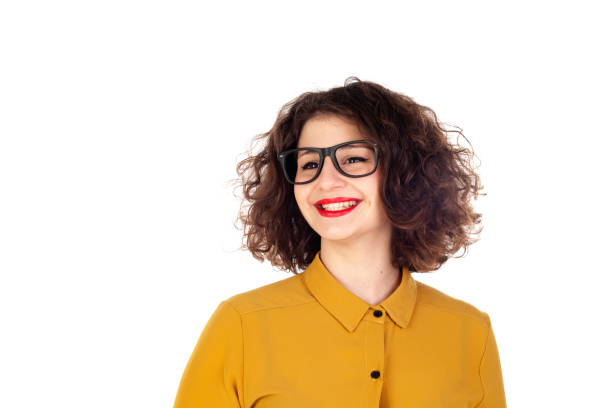 Smiling girl with yellow shirt and glasses Smiling girl with yellow shirt and glasses isolated on a white background big fat lips stock pictures, royalty-free photos & images