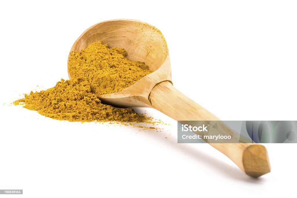 Açafrão-da-terra amarela na colher de madeira - Foto de stock de Amarelo royalty-free