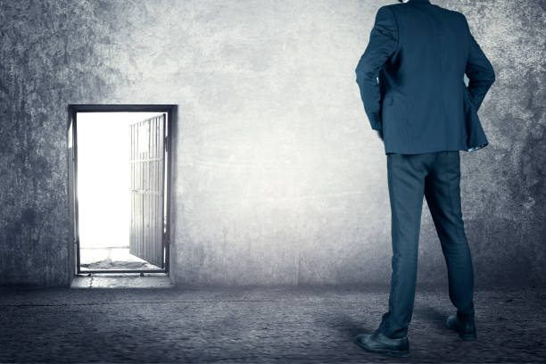 istock Business man going to the open door 1188381842