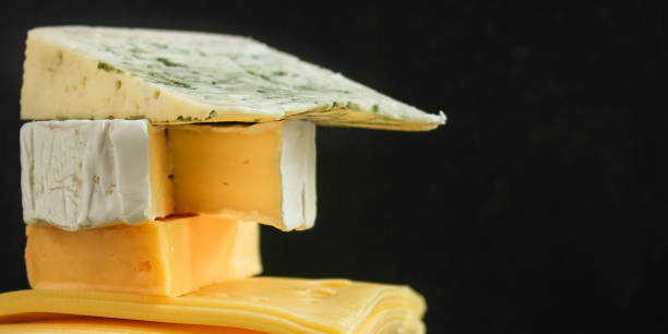 istock cheese, Assorted cheeses on one slate plate - tasting snacks. healthy food. copy space for text and lettering 1188382713