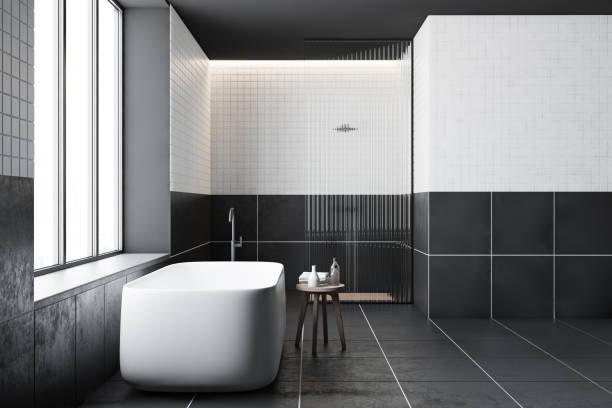 istock Side view of tiled bathroom, tub and shower 1188383142