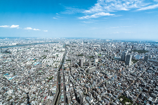 Aerial view of Tokyo city skyline, Sumida River Bridges and Asakusa area from Tokyo Skytree observatory. Daytime. Tokyo, Japan.