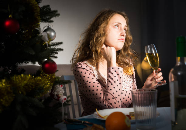 istock Sad woman celebrating New Year 1188387557